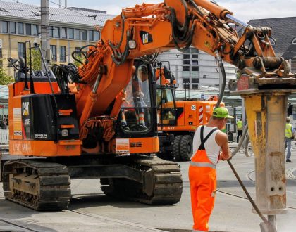 Constructors digging a road